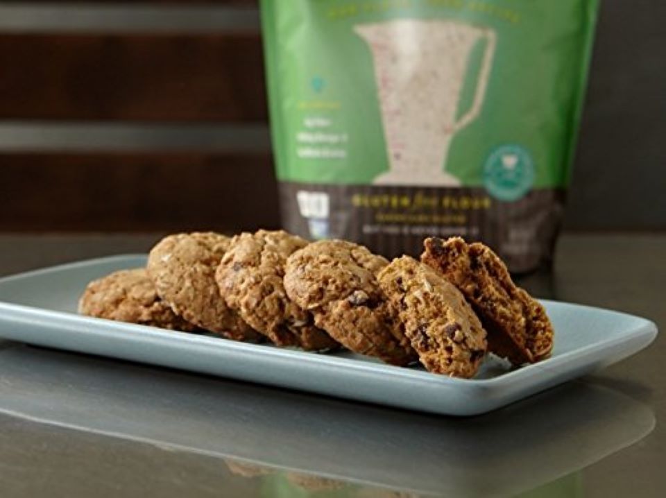 tray with cookies and flour behind it