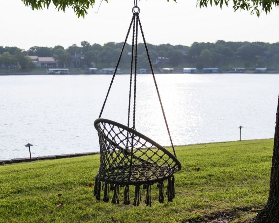 Equip Boho Macrame Hanging Chair in a tree by water