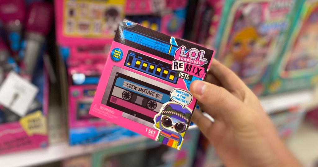 hand holding cassette tape toy box