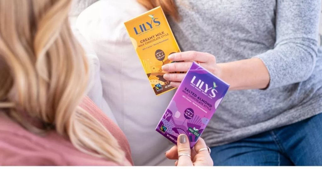 people holding Lilys Chocolate Bars