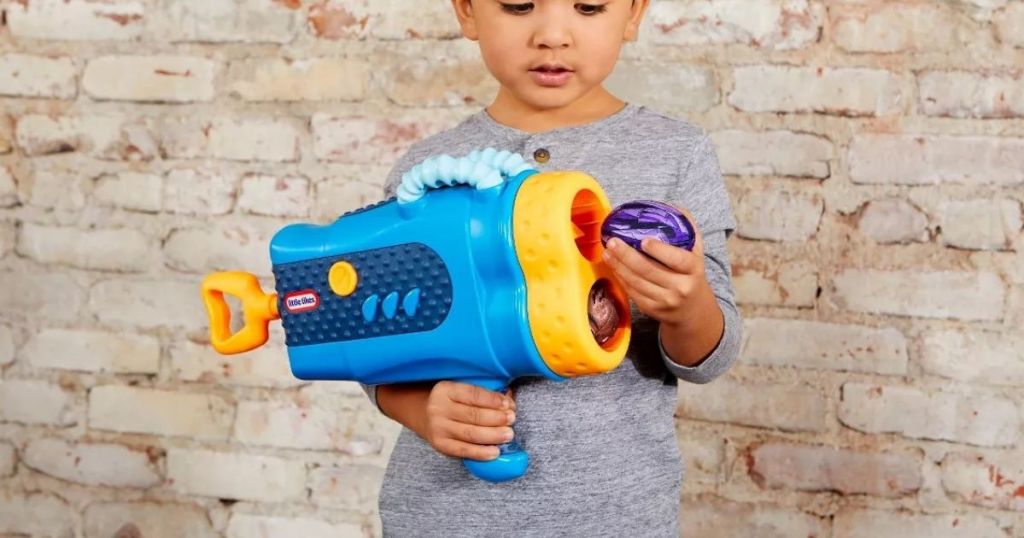 child playing with Little Tikes Blaster