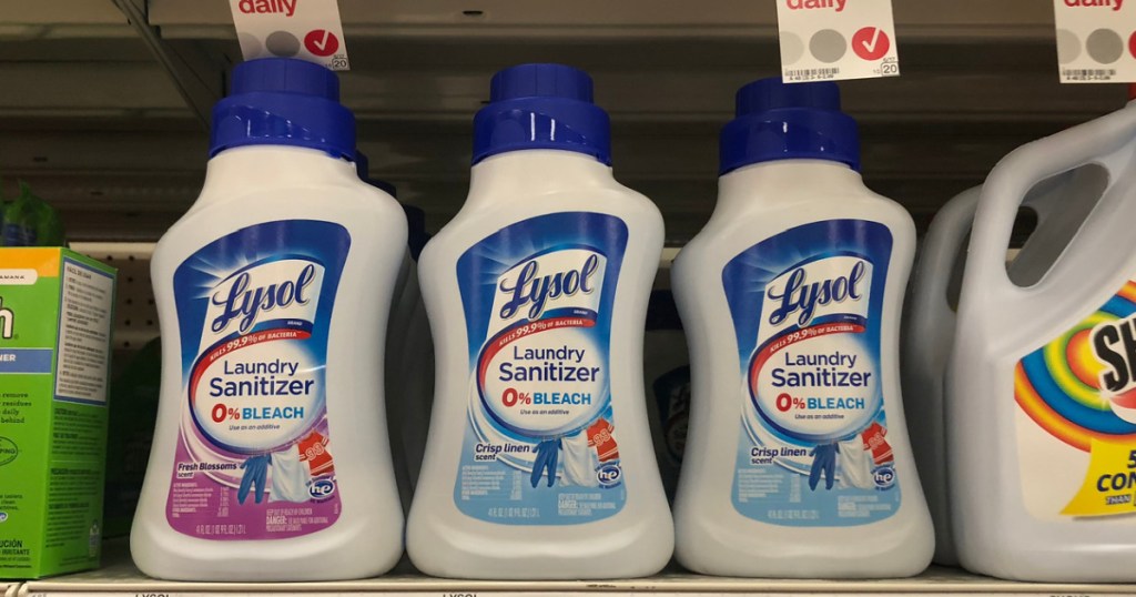 multiple bottles of lysol laundry sanitizer on store shelf