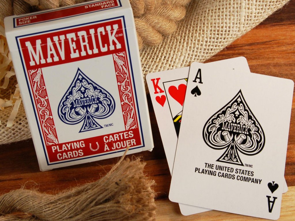 deck of playing cards with king and ace cards next to it