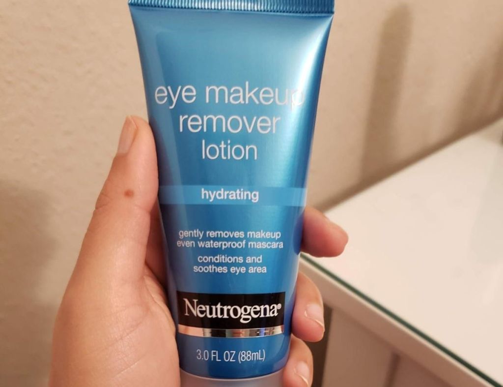 hand holding a Neutrogena Eye Makeup Remover