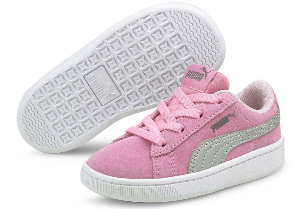 pair of pink suede puma sneakers