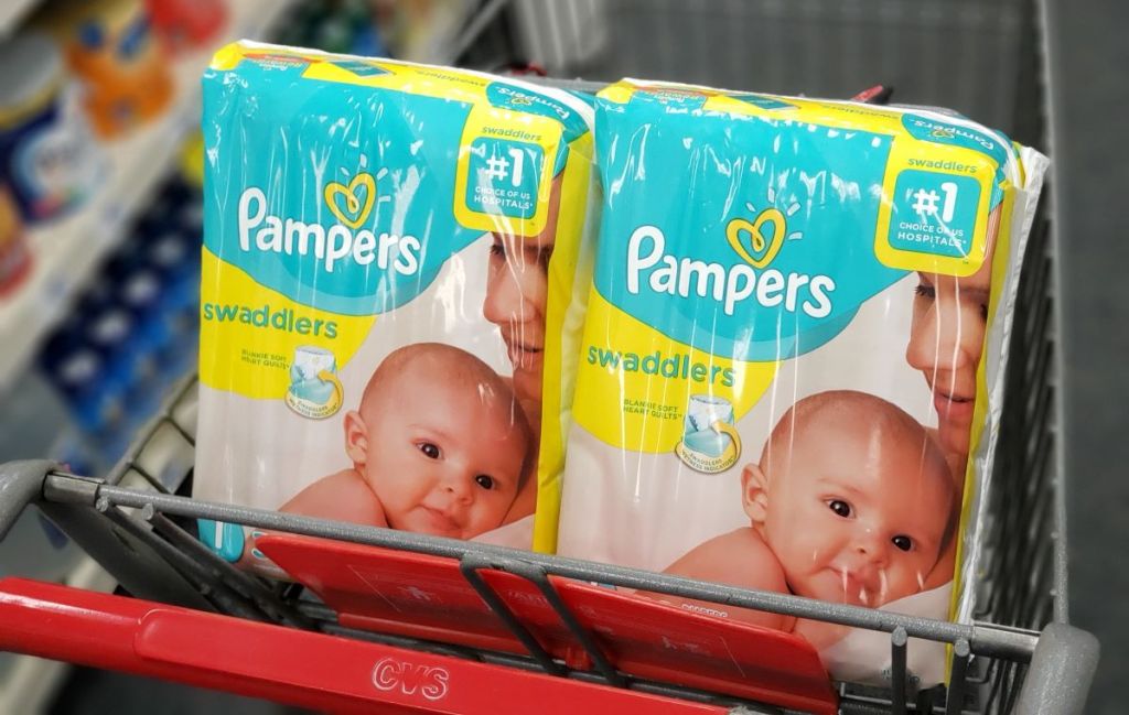 two bags of Pampers Swaddlers in a CVS cart
