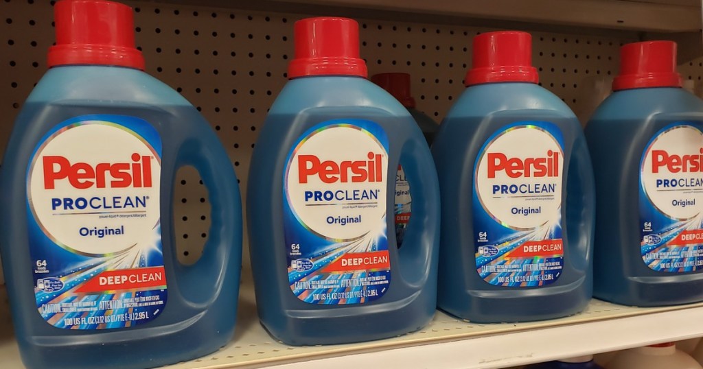 multiple bottles of persil liquid laundry detergent on store shelf
