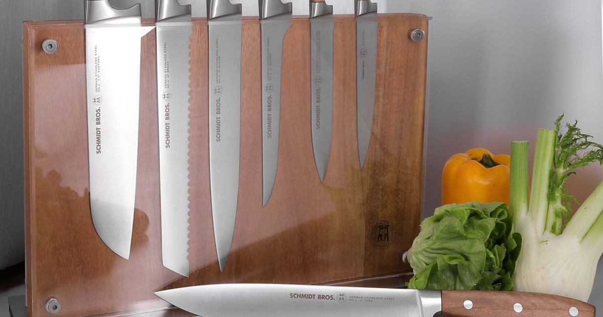 set of knives displayed on a clear knife rack