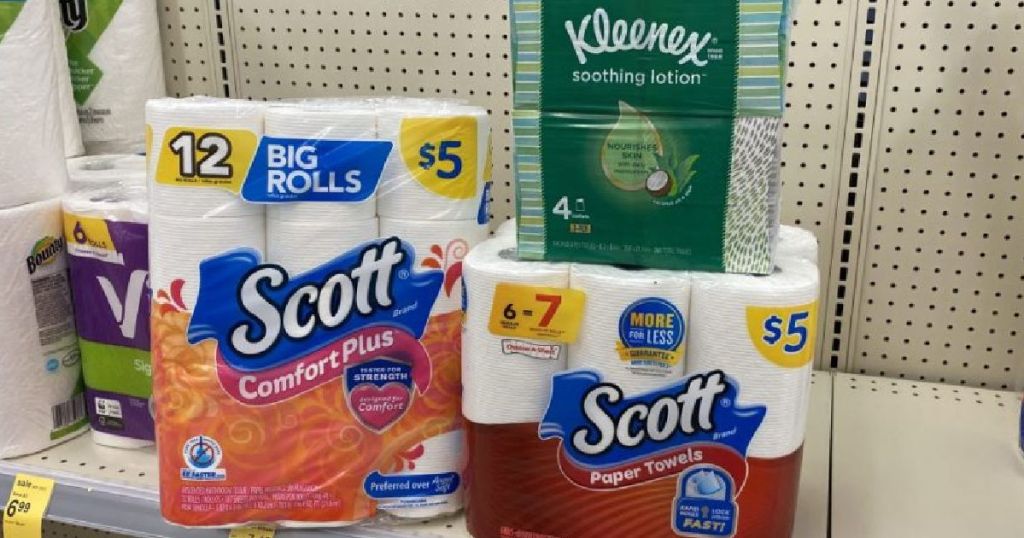 Paper towels, toilet paper and kleenex on shelf 