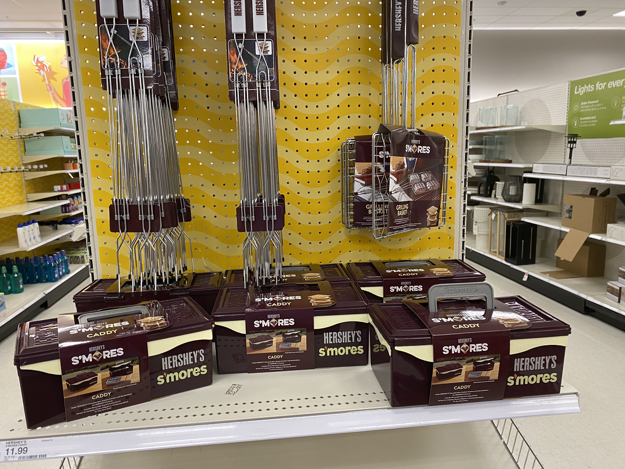 Smores Caddy and skewers on end cap at store