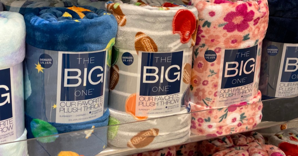 The Big One Plush Throw blankets on display in-store