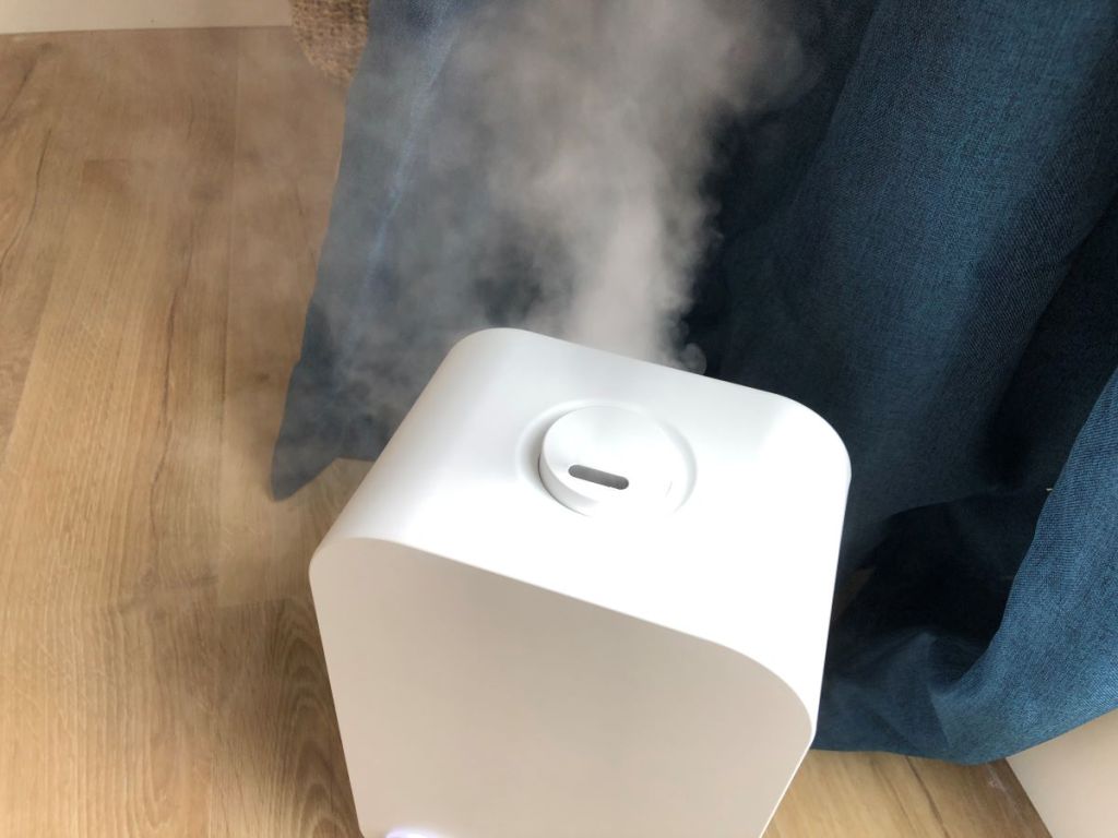 top of a humidifier with mist coming out