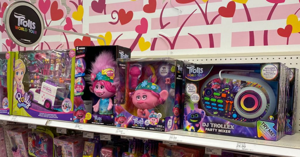 toy troll dolls on shelf 