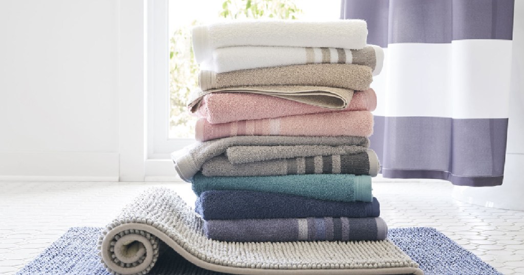 bath towels stacked in bathroom