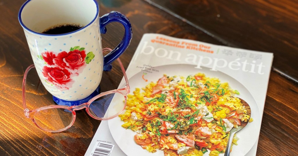 bon appetit magazine on table with cup and glasses