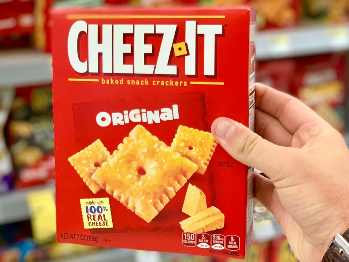 holding a box of Cheez-It crackers