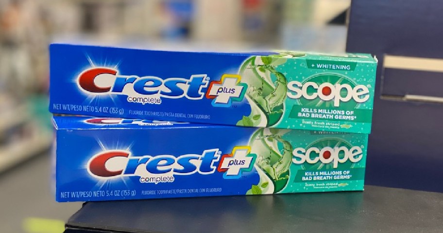 two packs of crest toothpaste
