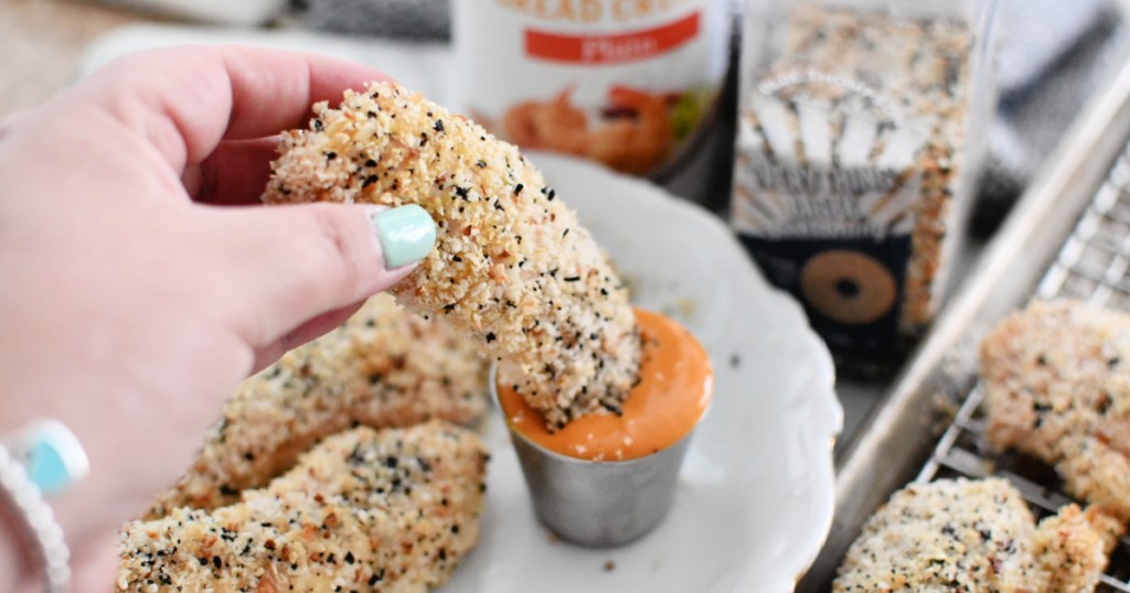 dipping an everything bagel chicken tender