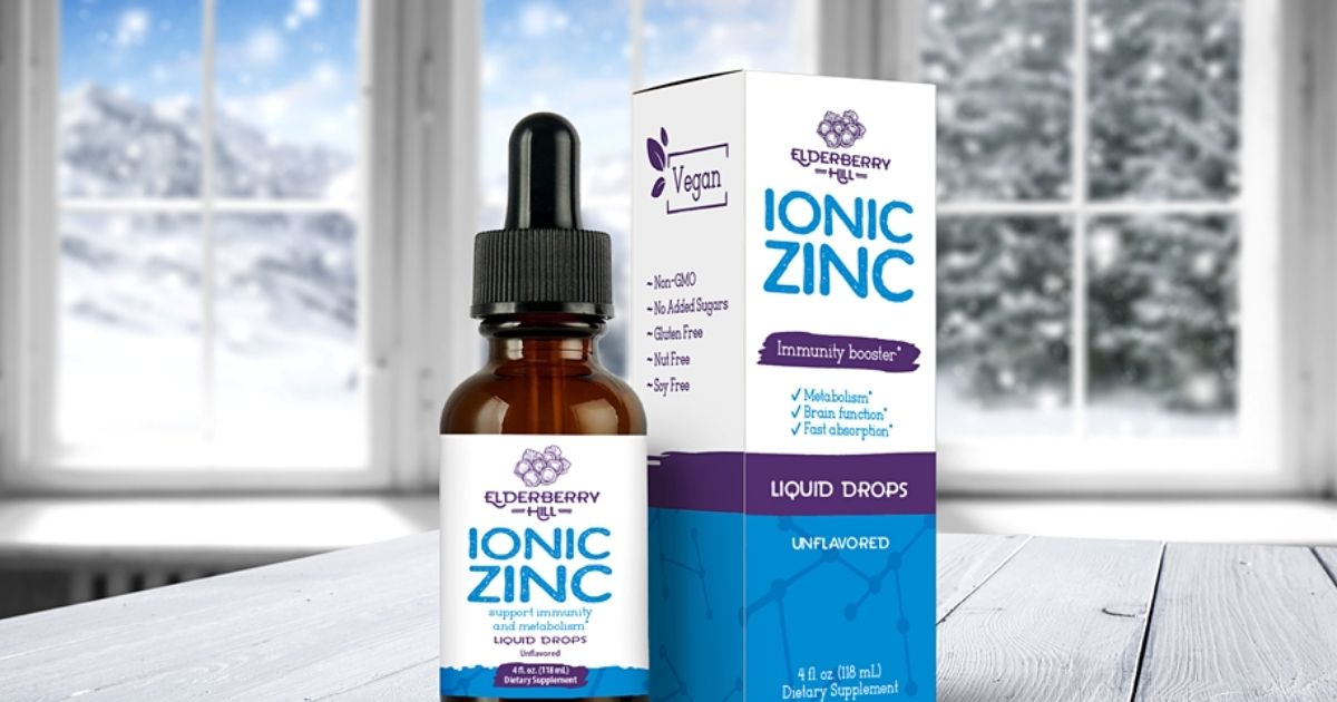 Elderberry Ionic Zinc drops on table with snow outside