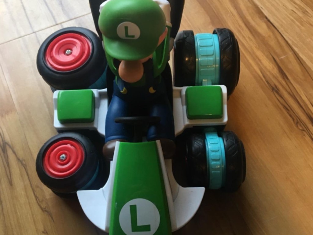green play car with character Luigi in it