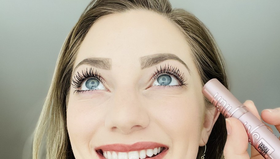 close up of womans eyes looking up