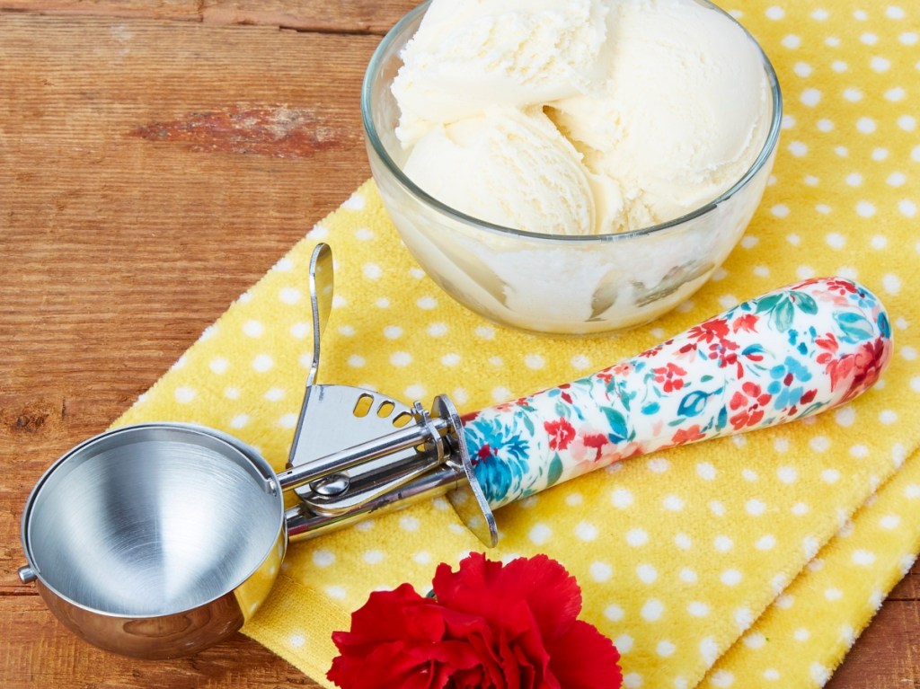 floral ice cream scoop next to dish of vanilla
