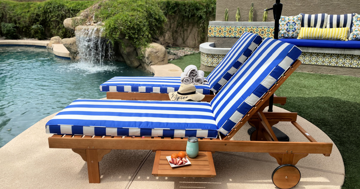 set of striped outdoor chaise lounge chairs