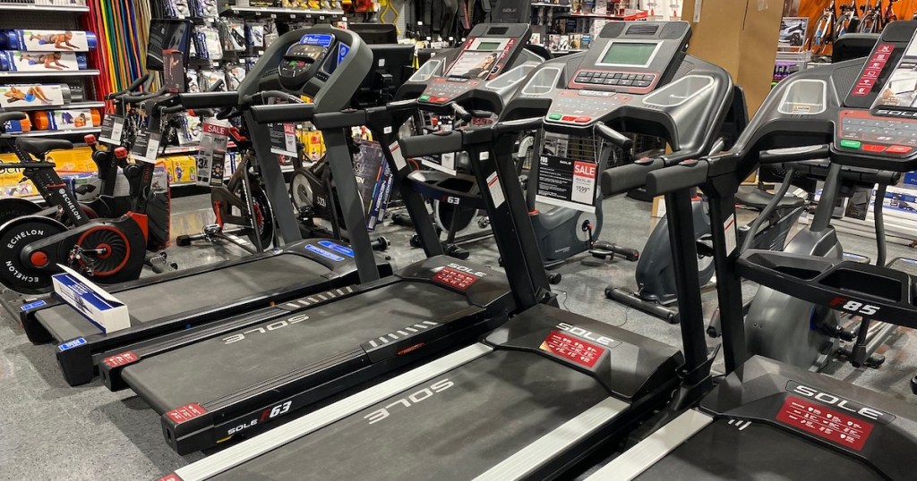 row of sole treadmills on store display