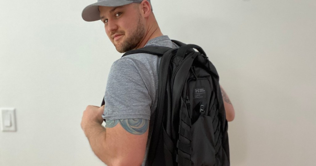 man wearing a black backpack