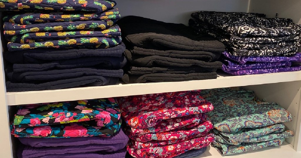 store shelf with different designs of fabric