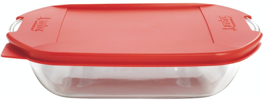 small glass container with red lid