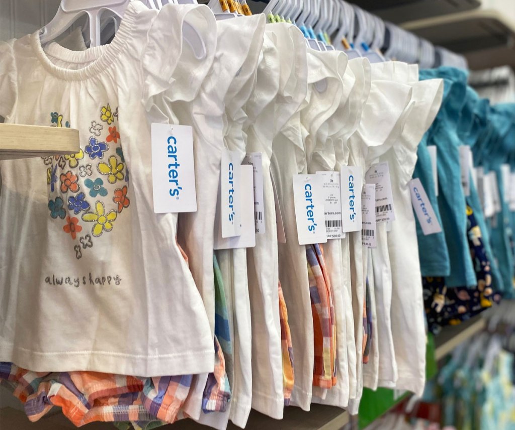 baby girl outfit sets on rack at carter's