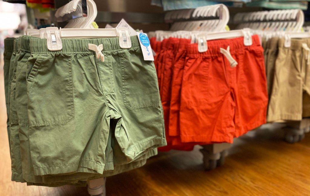 olive green and red pairs of boys shorts