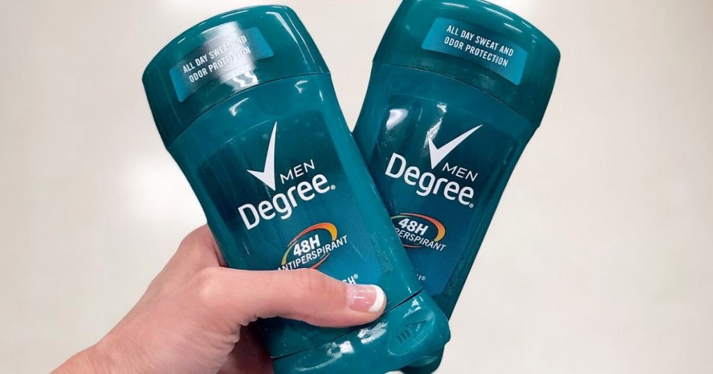 hand holding two Degree deodorants