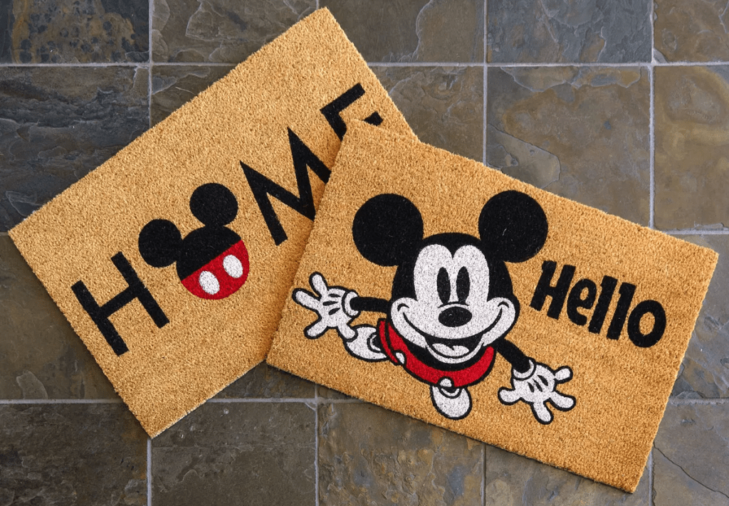 two Disney doormats