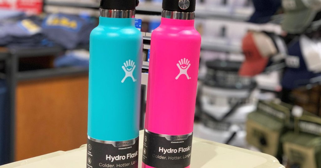 hydro flask water bottles in blue and bright pink