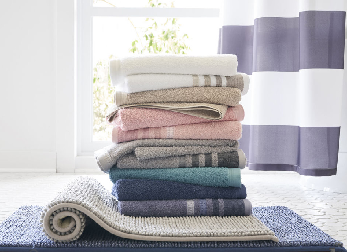 stack of bath towels in a bathroom