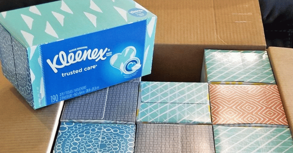 box of kleenex tissues on top of box full of more boxes of tissues