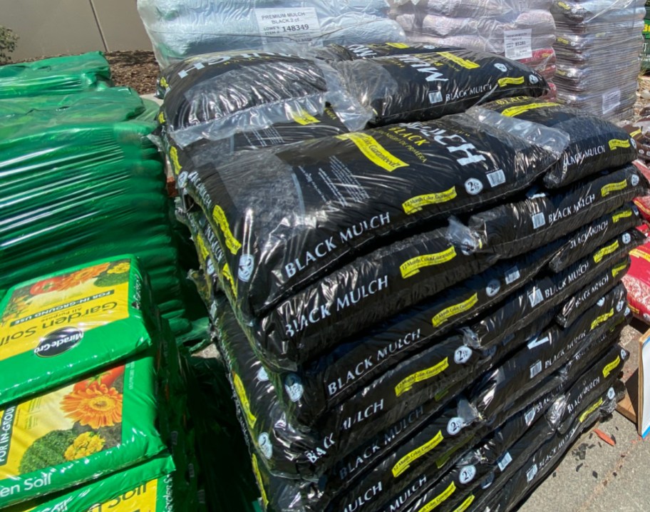 large outdoor display of bags of mulch