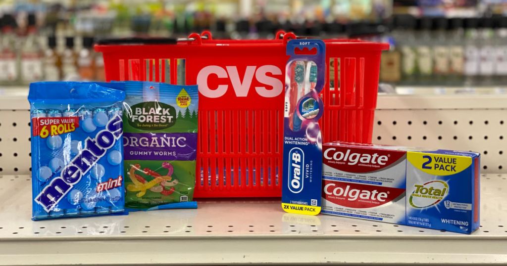 candy or oral care products in front of red basket 