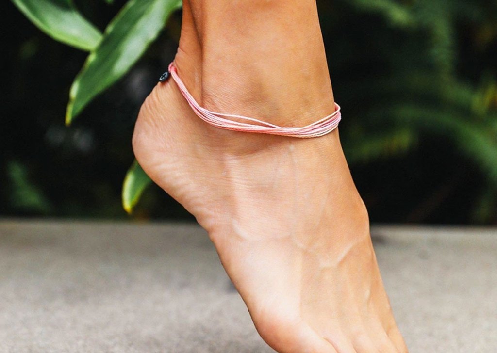 pink anklet on foot