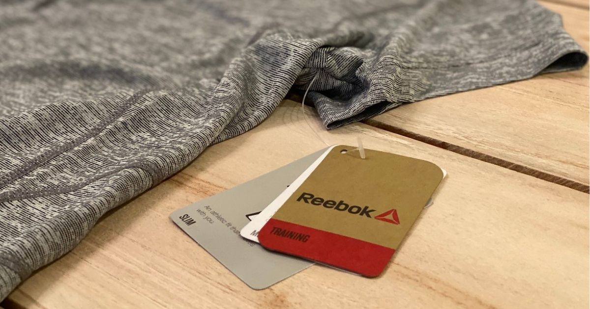 reebok shirt with tag on it