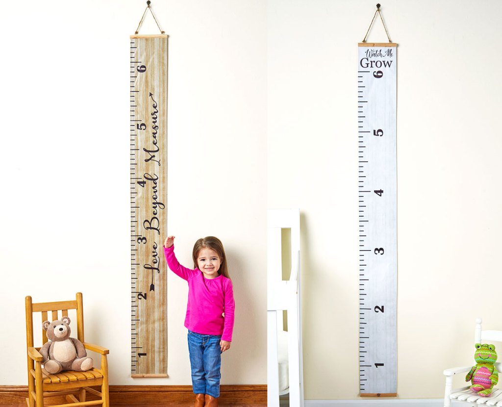 two kids growth ruler charts on wall