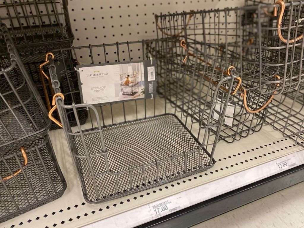 Threshold stackable wire baskets on store shelf