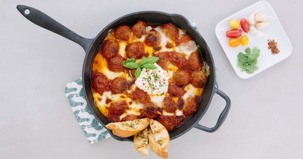cast iron skillet with food inside of it