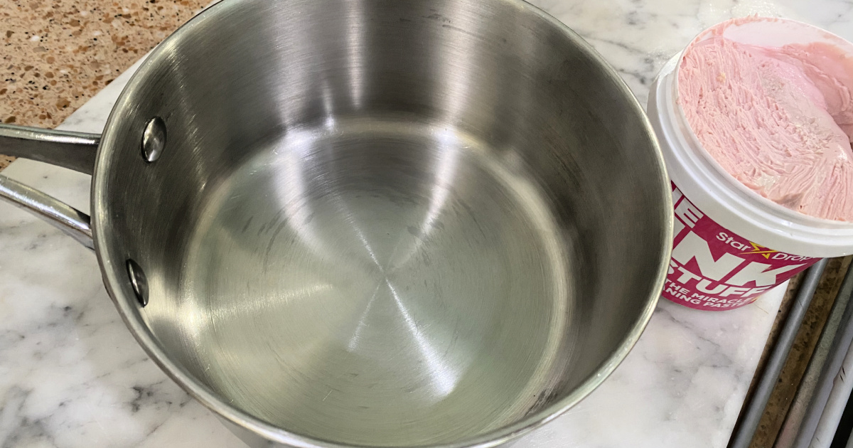 cleaning stainless dishware with pink stuff cleaner