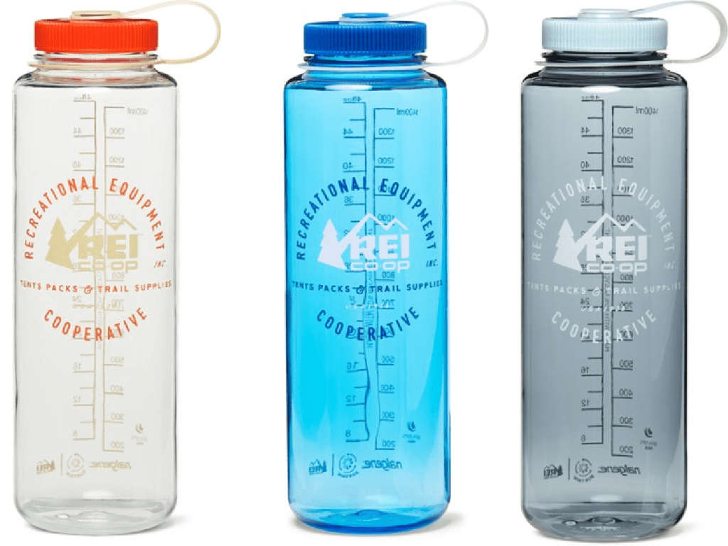 three tall water bottles on white background