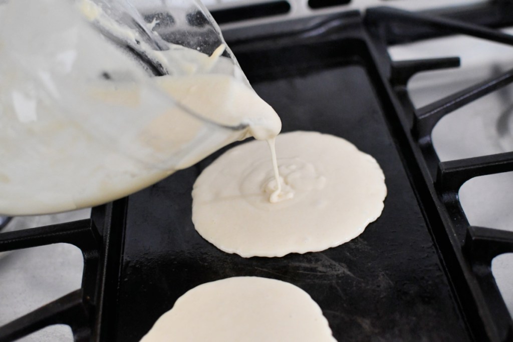 pouring from scratch pancake batter