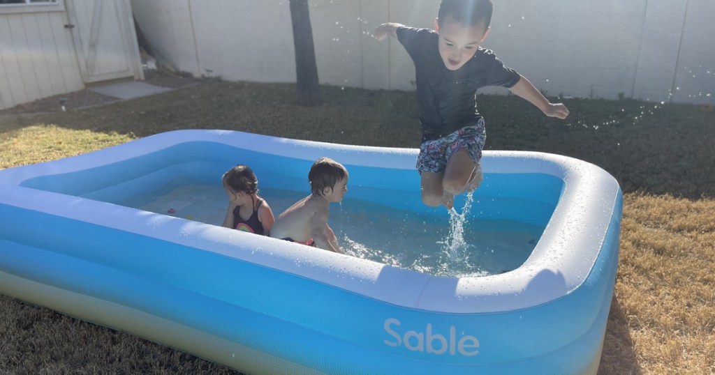 kids in inflatable pool