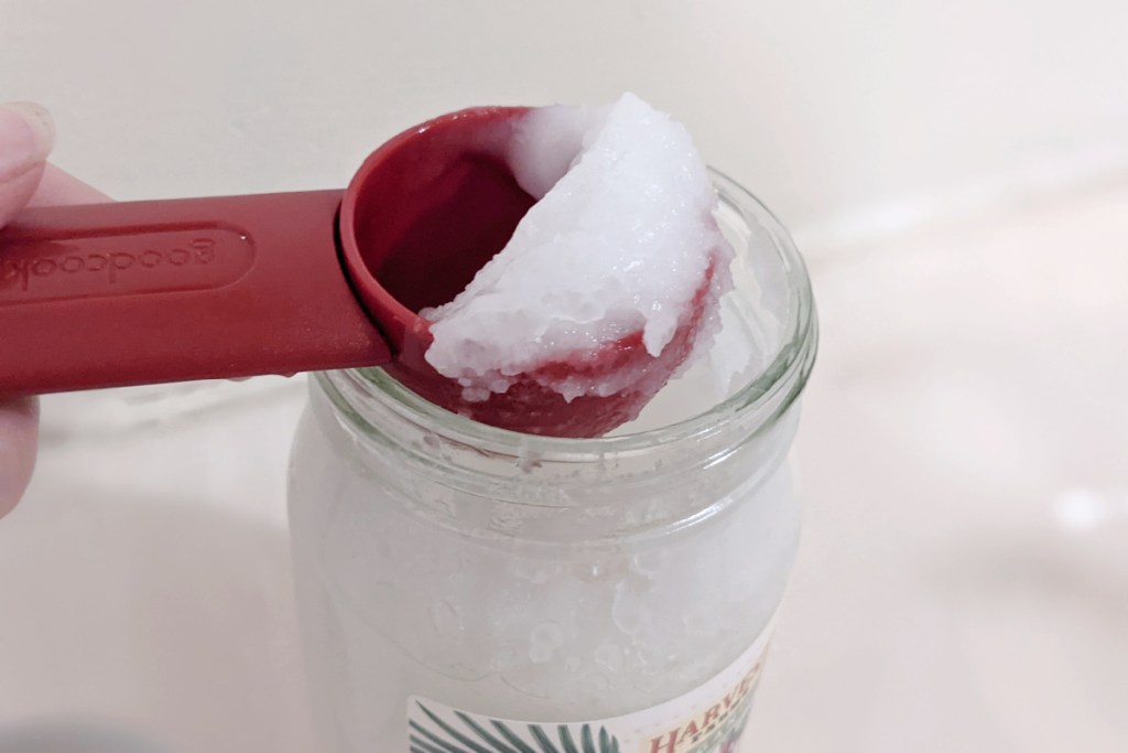 solid coconut oil in tablespoon measurer